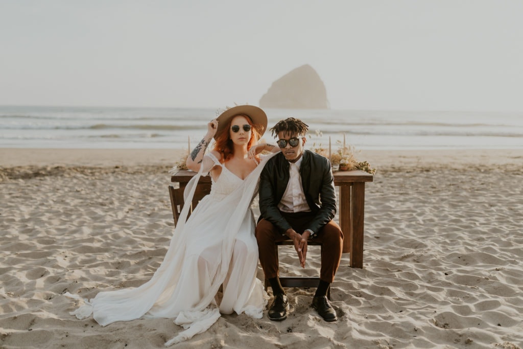 A couple eloping on the beach in Malibu, California.