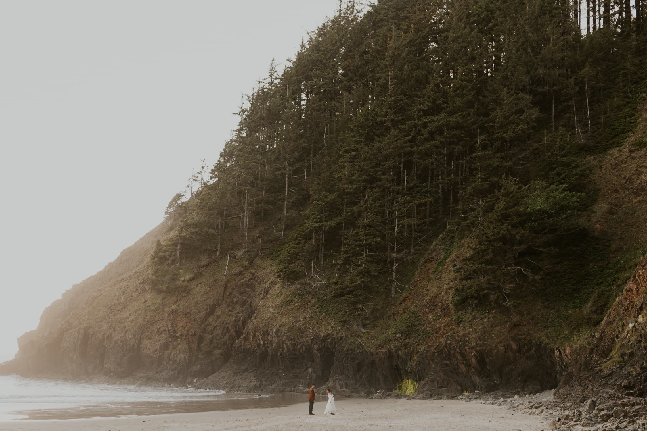 A couple at Indian Beach in Oregon on their elopement day.