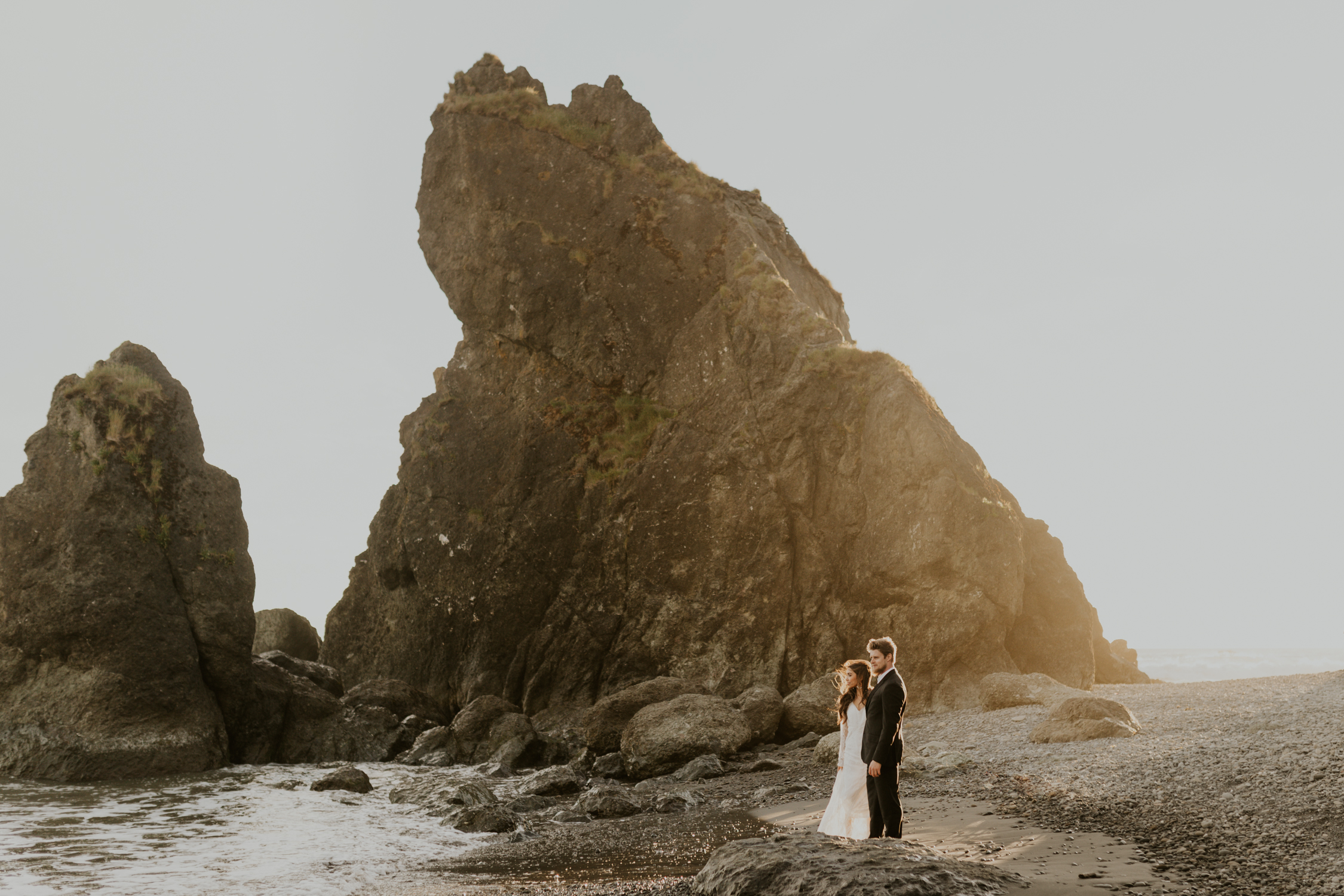 A bride and groom on Ruby Beach on their elopement day.