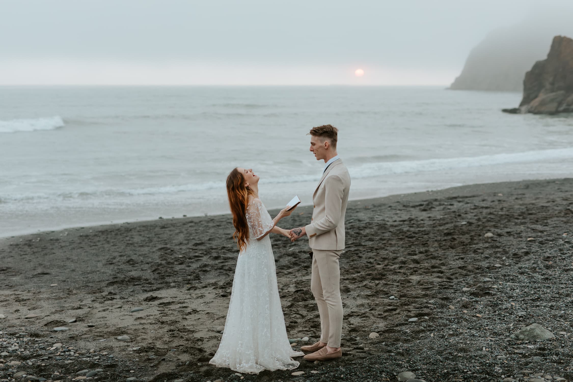 A bride and groom exchanging vows on Ruby Beach on their elopement day.