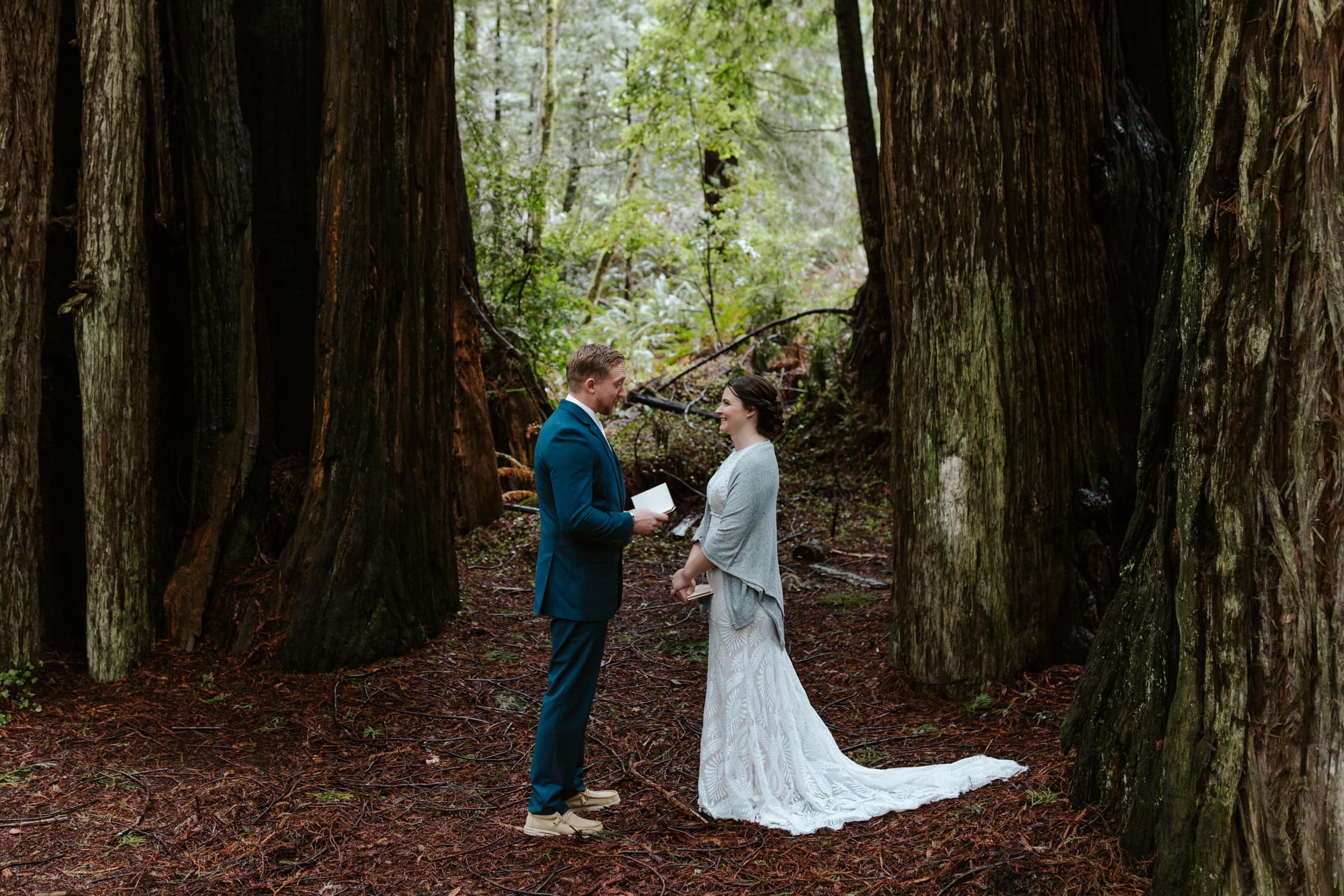 A bride and groom exchanging vows in Templeman Grove in Redwood National Park.
